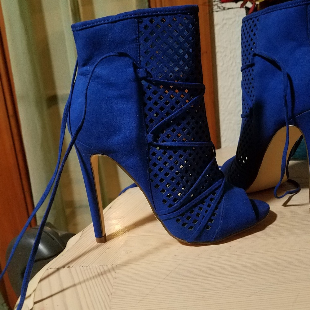 Electric Blue bootie heels. New (used once)